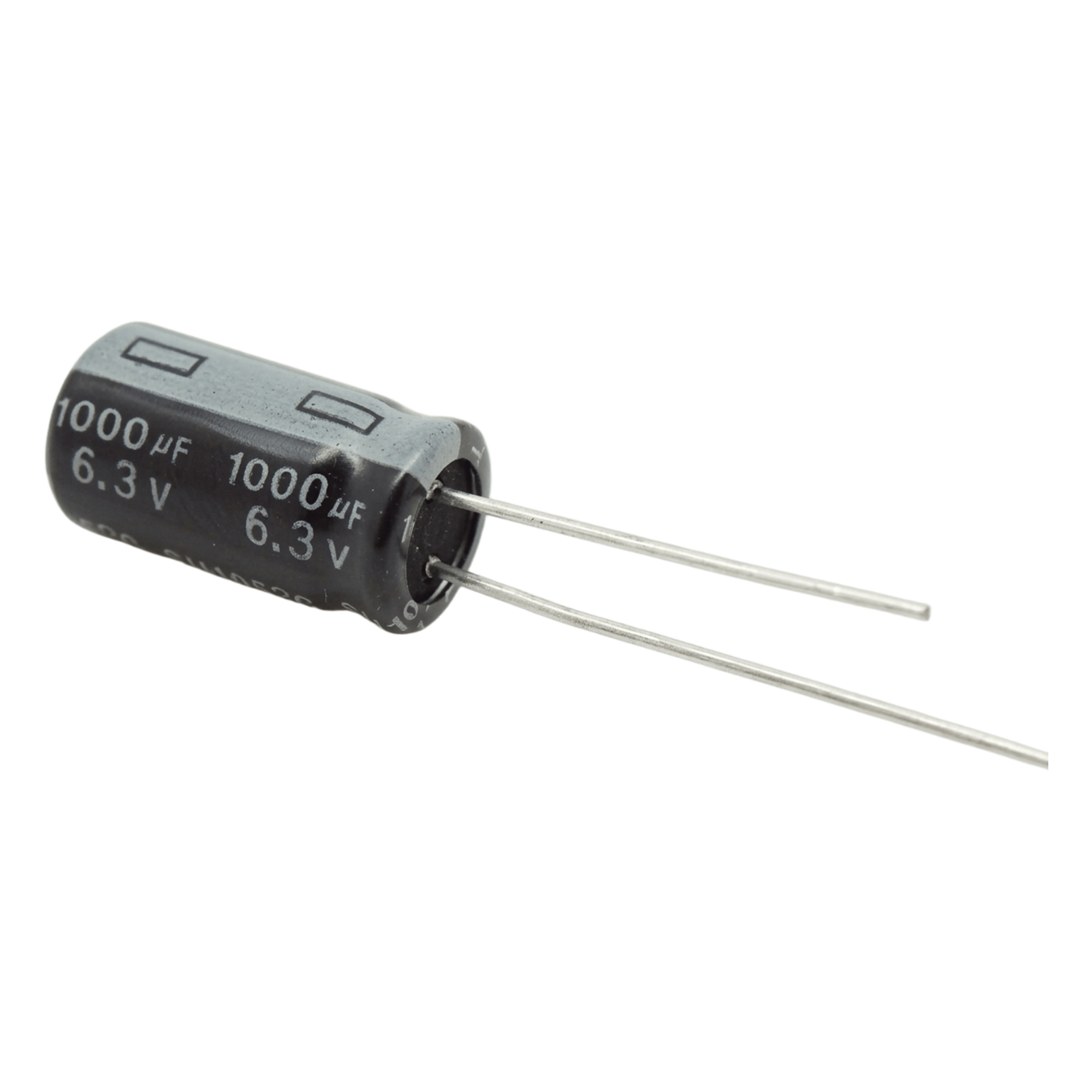 Capacitor Electrolítico / 1000 µF / 6.3 V / Diseño Compacto / Circuitos Estándar — SYSCOM · SKU 1000MF06.3V